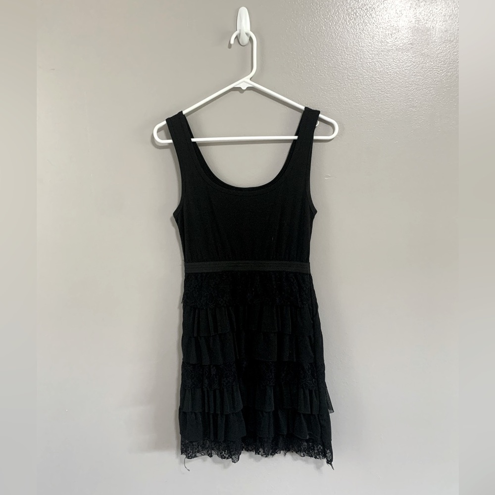 Black dress with lace skirt.